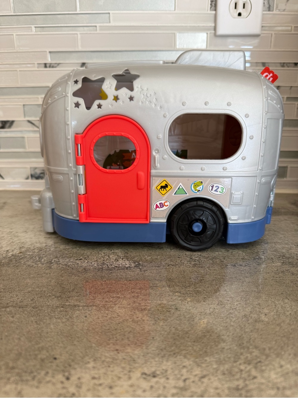 Silver Kids Camper Playset with Bright Red Door and Blue Base